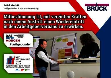 Plakat zur Mitbestimmungsmesse mit dem Slogan "Mitbestimmung ist, mit vereinten Kräften nach einem Austritt einen Wiedereintritt in den Arbeitgeberverband zu erwirken"